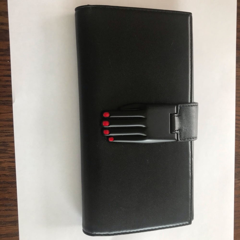 Opening ceremony black wallet.